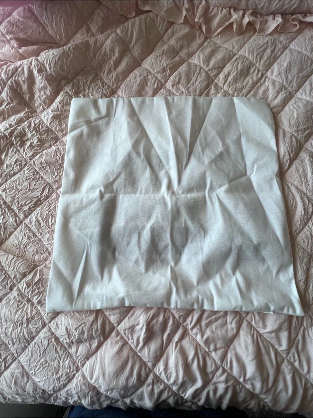 Source Unknown white pillow